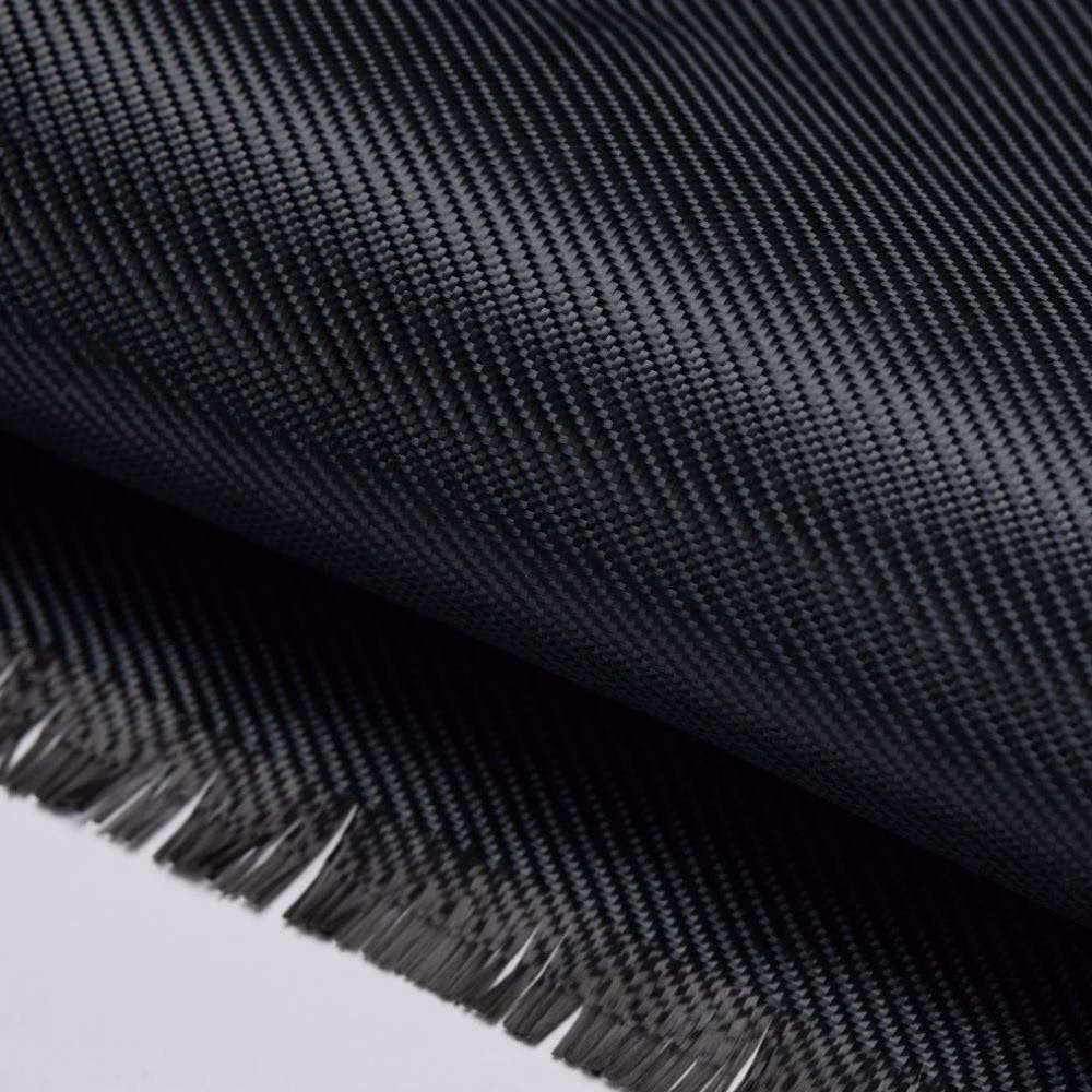 Макрофотографія фірмового плетіння арамідного волокна Twill Black/Grey для преміальних аксесуарів Pitaka